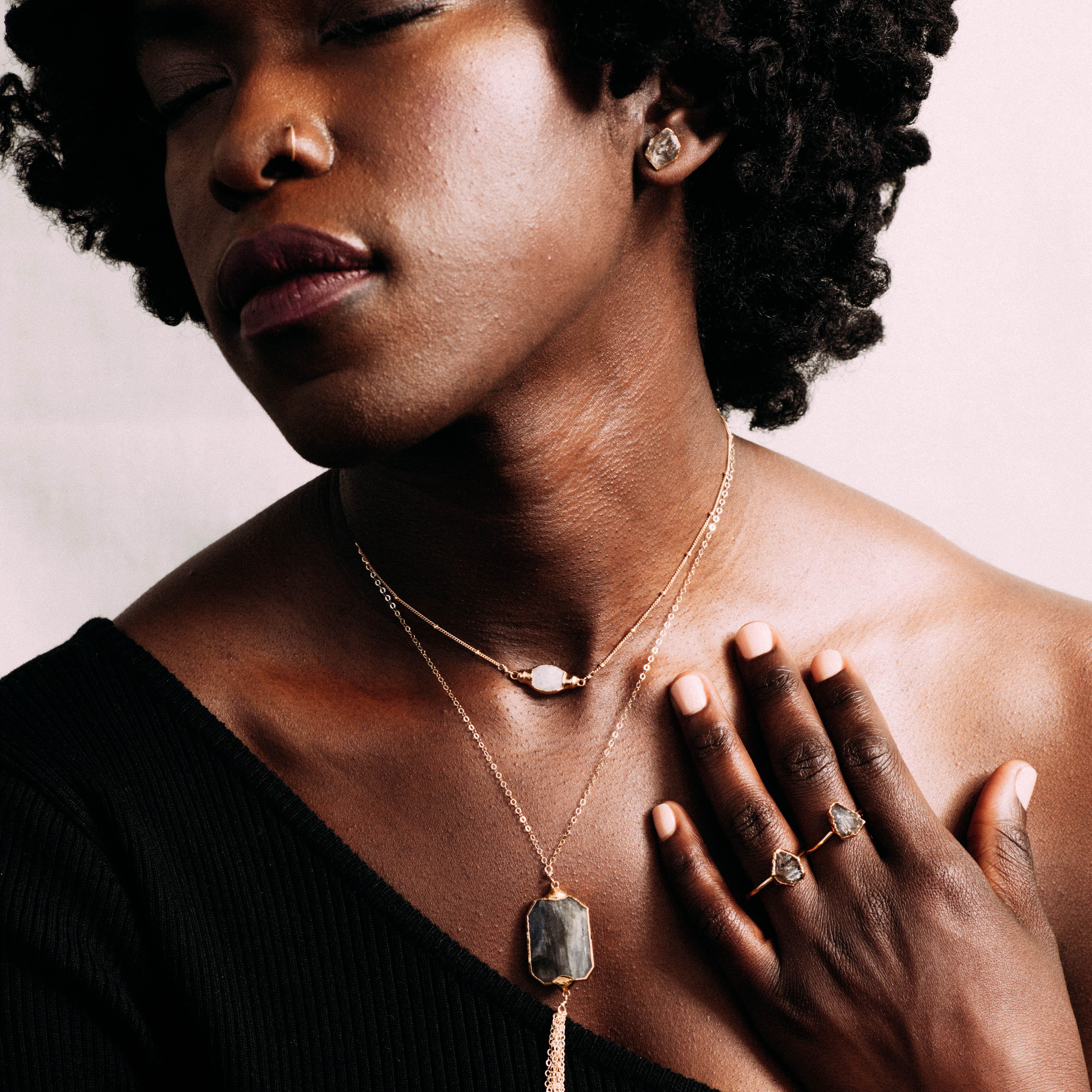 Cute trendy necklaces and rings that you can layer. Neutral, white and gray color stones. Short and long necklaces for women. We show you how to layer jewelry.