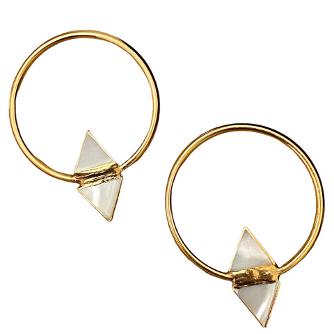 Jenn Tran in the bachelorette. Big hoop earrings with mother of Pearl gold earrings. 