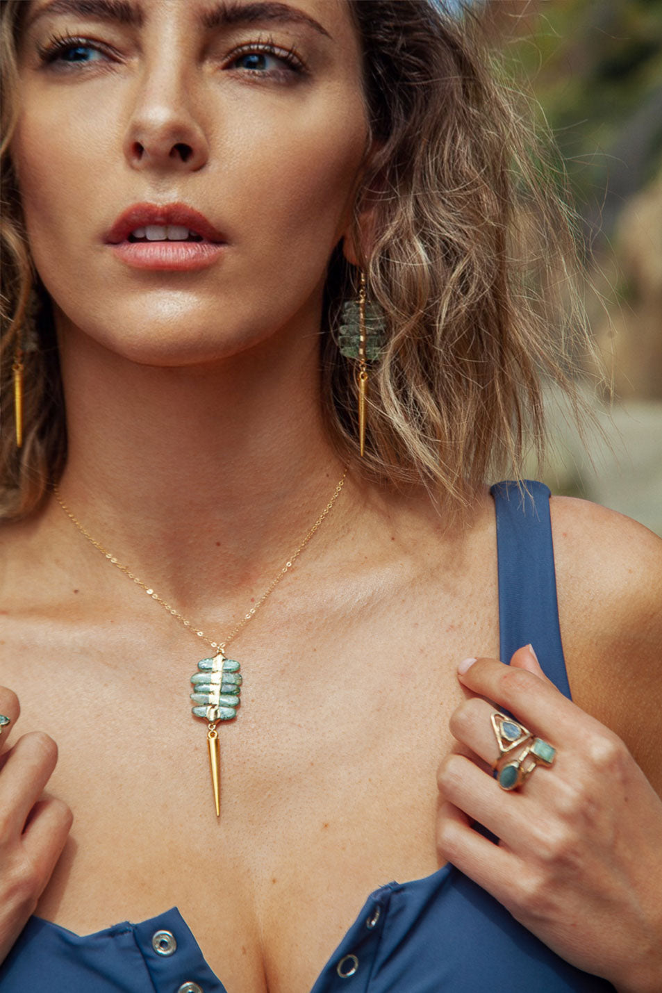 Luna Ring: Beautifully simple hand-hammered wire band with a .5" blue kyanite oval stone. Timeless elegance to enhance your style.