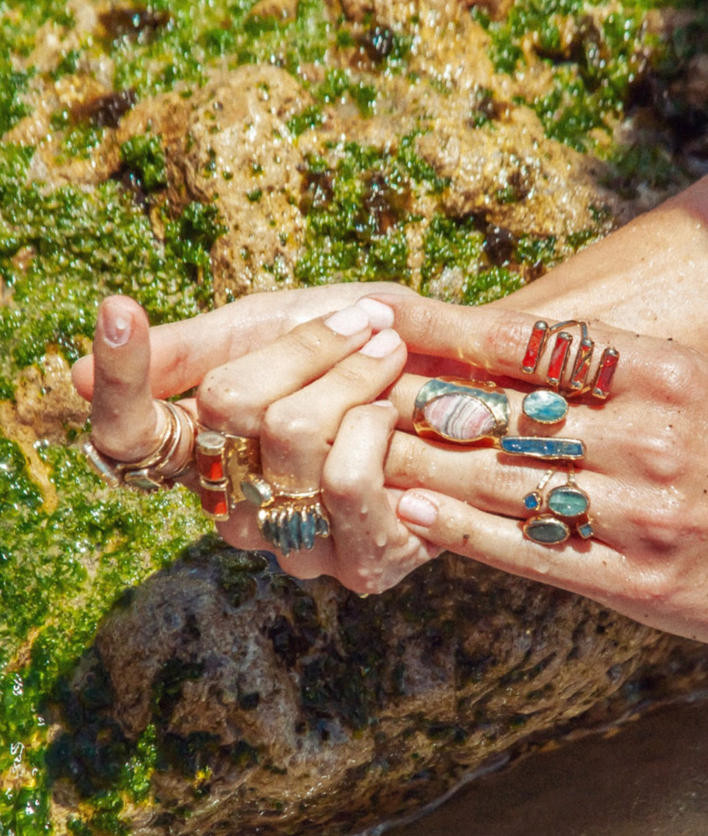 The Eleanor ring: a bold statement piece. Unique lapis stick and kyanite stone create a striking combination with varying coloration. Kyanite measures 1/2" while the larger lapis stone is approximately 1" long.