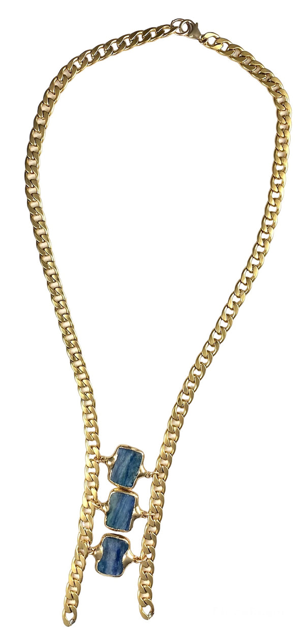 Triple blue kyanite stones on an asymmetrical chain. Stand out with this one-of-a-kind style!