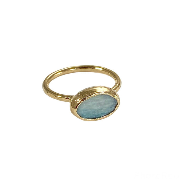 Luna Ring: Beautifully simple hand-hammered wire band with a .5" blue kyanite oval stone. Timeless elegance to enhance your style.