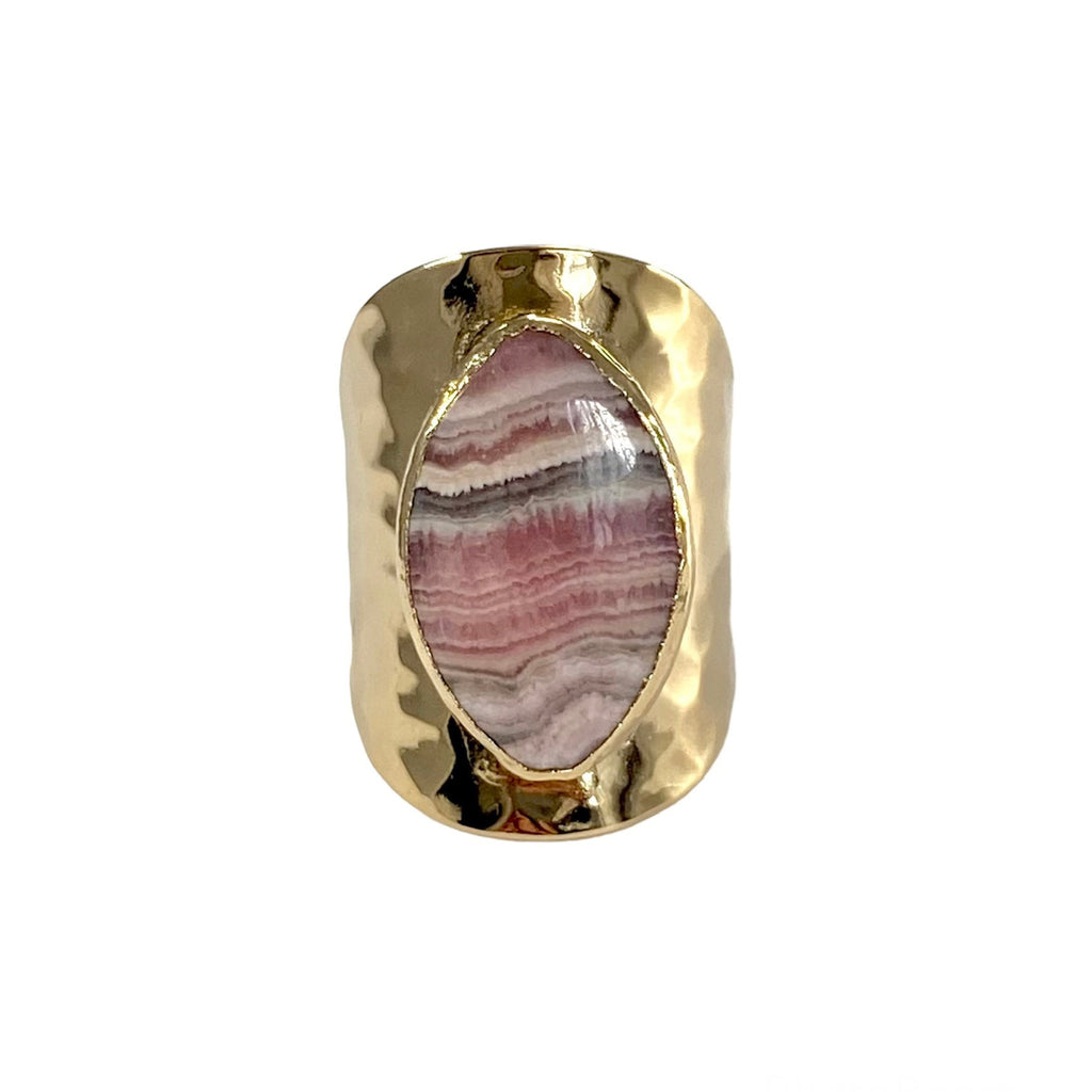 Avery: Adjustable hand-hammered ring with captivating Rhodochrosite stone. Mesmerizing design at 1 inch long