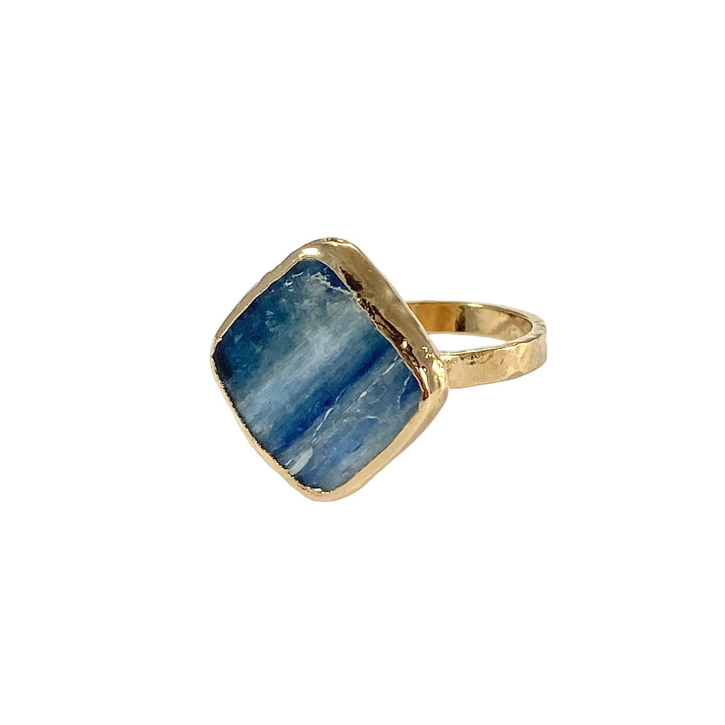 Embrace Nature's Beauty with the Mia Ring. Featuring a unique blue kyanite stone in a diamond shape, this stunning piece measures 3/4 inch. Each stone is one-of-a-kind, and the hammered band adds texture.