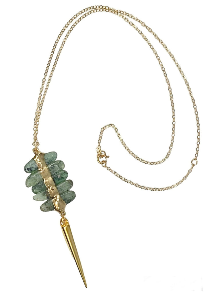 Savannah Necklace: Stylish blend of elegance and edge. Stacked Kyanite pendant with metal spear on a 16-18" chain. 2.75" stones vary in shape and color.