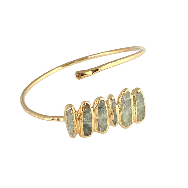 Cameron Bracelet: Striking statement piece with hand-hammered design and adjustable fit. Green kyanite stone clusters create captivating, unique pattern. Stone cluster is approximately 1.25" long.