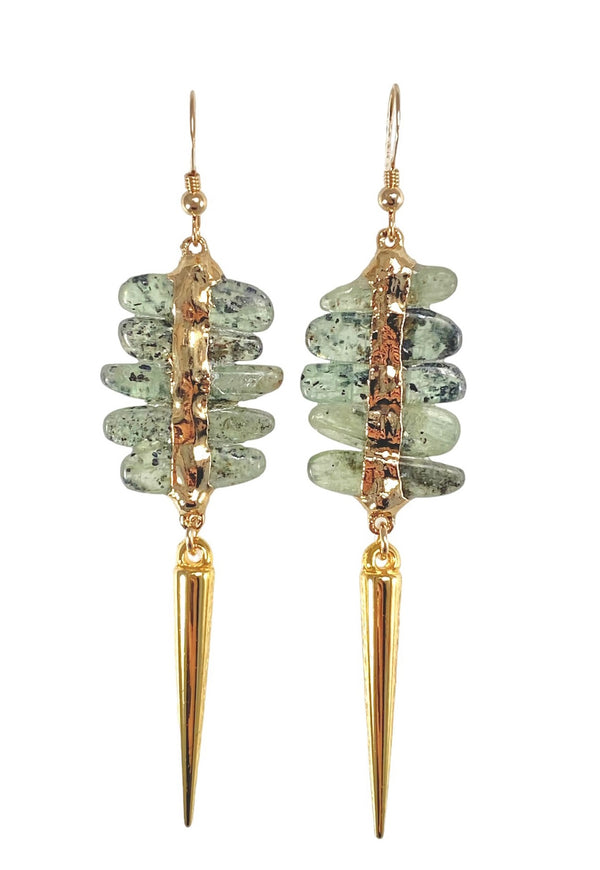 Sebastian earrings are the perfect lightweight statement pieces for day to night transitions. With stacked kyanite stones and a metal spear pendant, they effortlessly add a touch of funk to your look. These earrings, measuring 2.75 inches in length, are the ideal accessory for a stylish and versatile style.