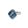 Embrace Nature's Beauty with the Mia Ring. Featuring a unique blue kyanite stone in a diamond shape, this stunning piece measures 3/4 inch. Each stone is one-of-a-kind, and the hammered band adds texture.