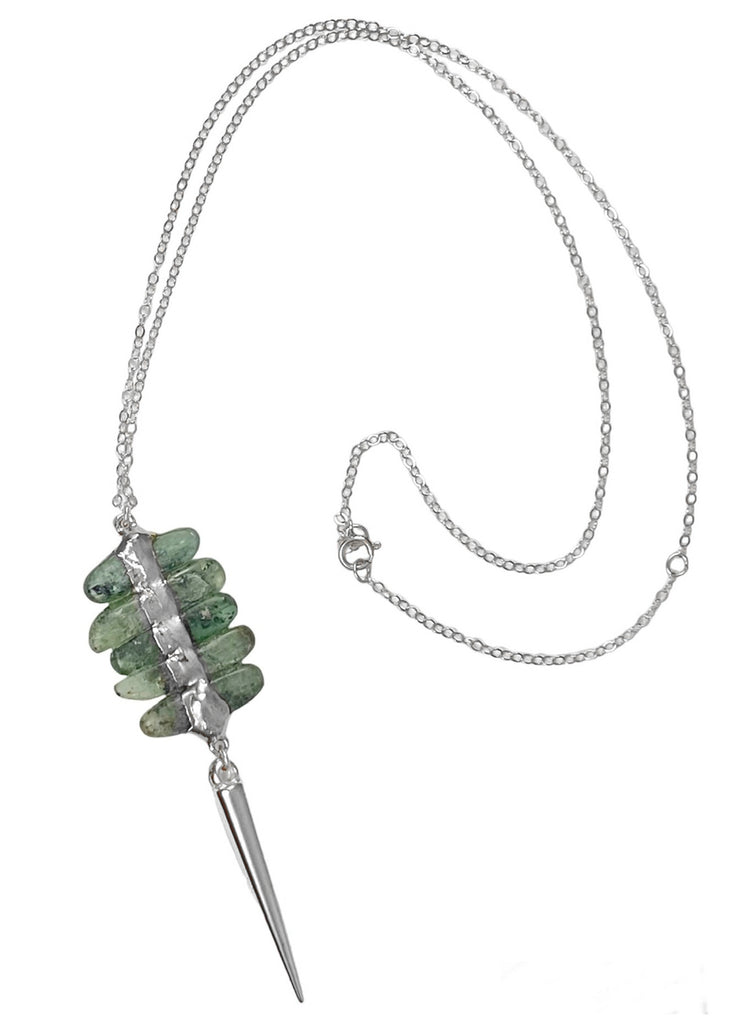 Savannah Necklace: Stylish blend of elegance and edge. Stacked Kyanite pendant with metal spear on a 16-18" chain. 2.75" stones vary in shape and color.
