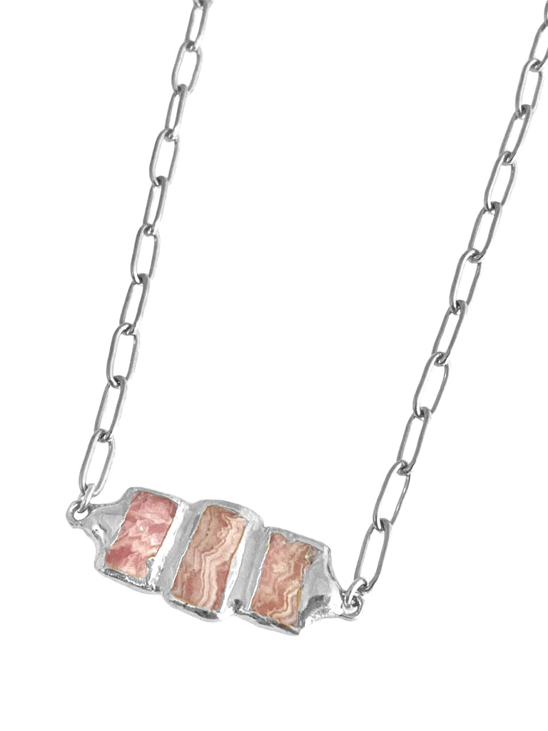 Delilah: Perfect for layering, featuring a small paperclip chain and triple Rhodochrosite stones. Unique and stylish, allowing you to express your individuality and creativity. Stone pendant is 1 inch long, varying in size, shape, and coloration.