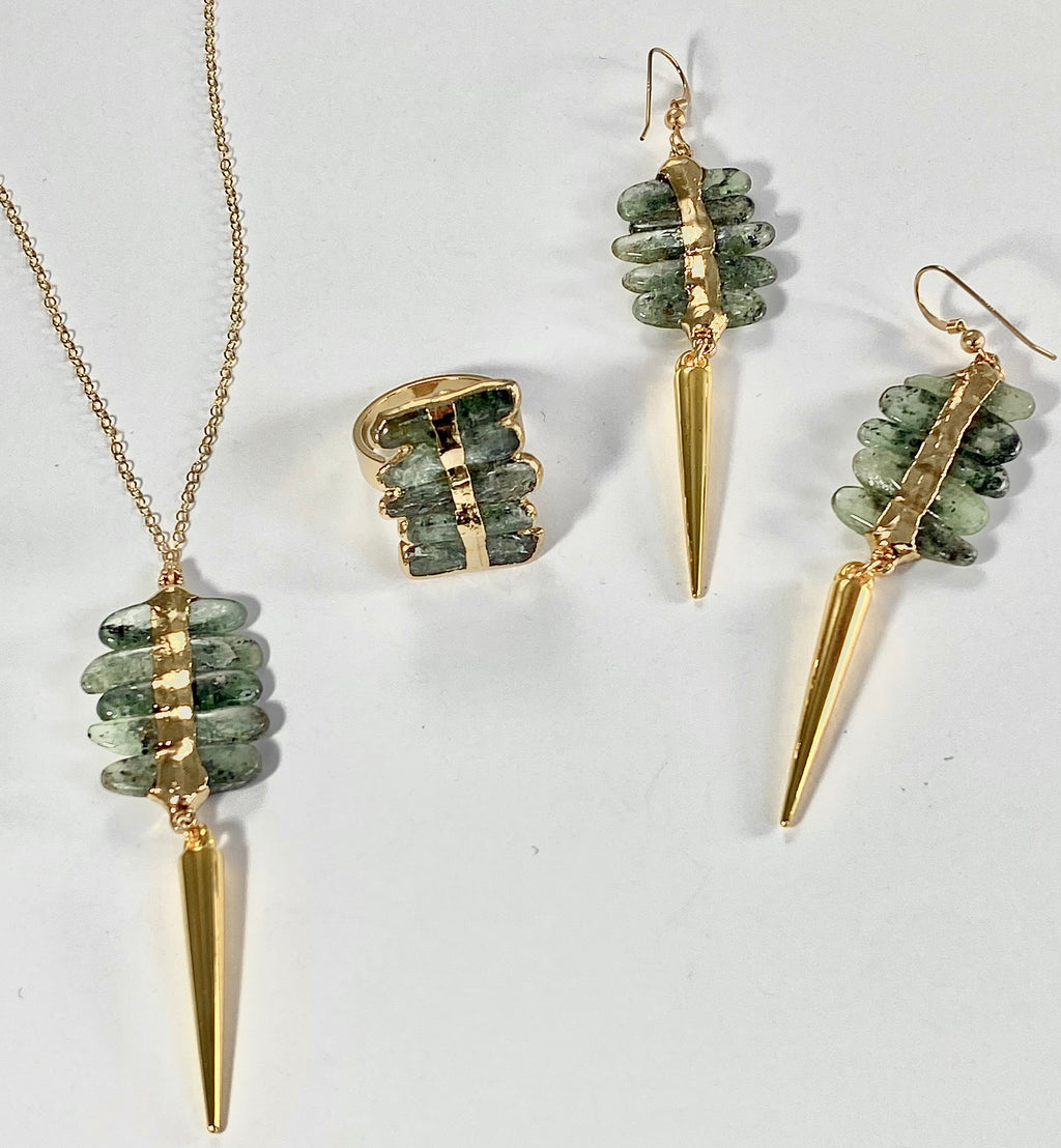 Savannah Necklace: Stylish blend of elegance and edge. Stacked Kyanite pendant with metal spear on a 16-18" chain. 2.75" stones vary in shape and color.