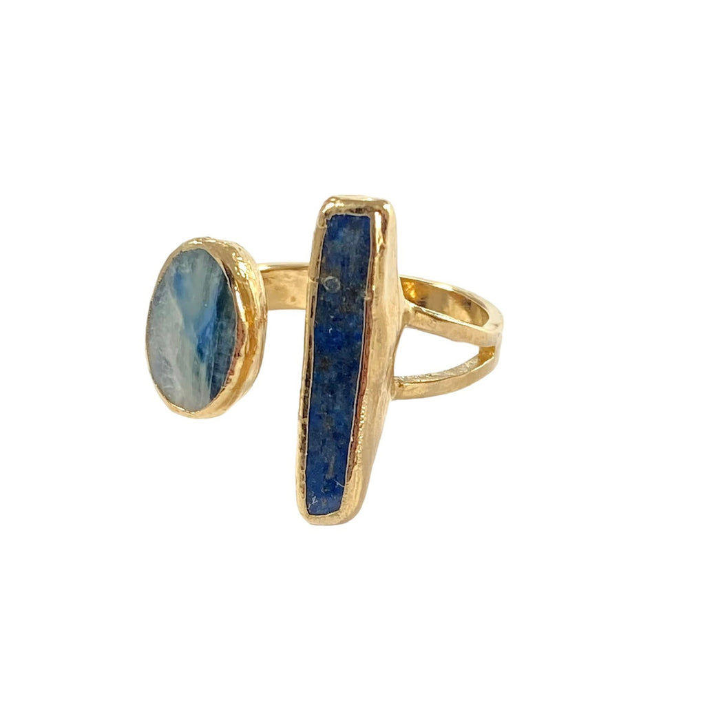 The Eleanor ring: a bold statement piece. Unique lapis stick and kyanite stone create a striking combination with varying coloration. Kyanite measures 1/2" while the larger lapis stone is approximately 1" long.