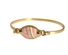 Samuel: Sophisticated ID bracelet with side loop closure and marquis-shaped Rhodochrosite stone. One-inch stone varies in coloration for a unique look. Modern twist on a classic design. 1/8 inch wide wire around bracelet.