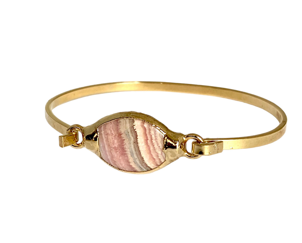 Samuel: Sophisticated ID bracelet with side loop closure and marquis-shaped Rhodochrosite stone. One-inch stone varies in coloration for a unique look. Modern twist on a classic design. 1/8 inch wide wire around bracelet.